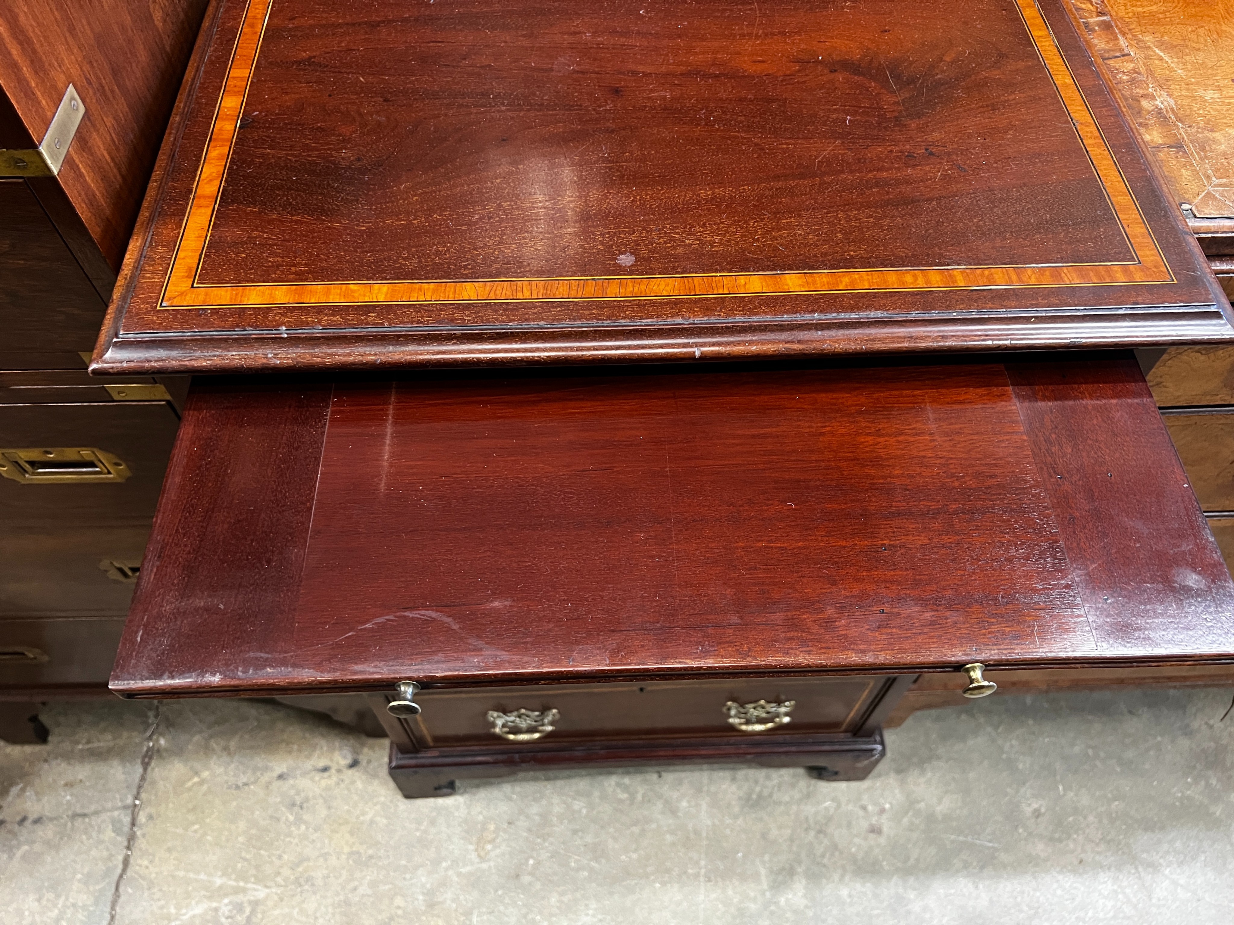 A small George III style satinwood banded mahogany four drawer chest fitted slide, width 56cm, depth 48cm, height 82cm